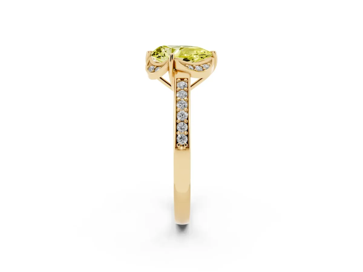 Fancy Yellow Pear Cut Cut Halo Diamond Ring with Channel Set Band and Four-Prong Setting Yellow gold