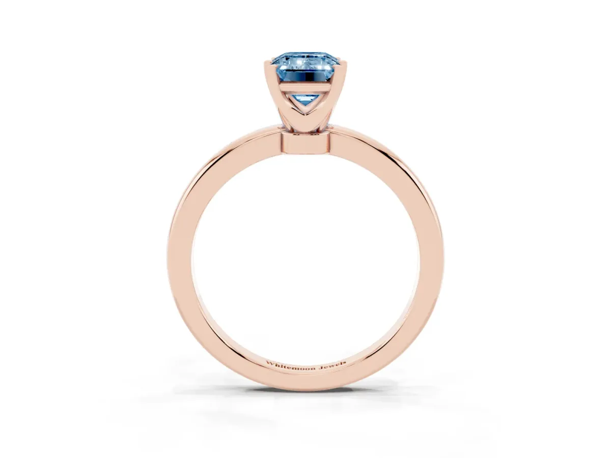 Fancy Blue Emerald Cut Solitaire Diamond Ring with Six-Prong Setting on a Classic Band Rose gold