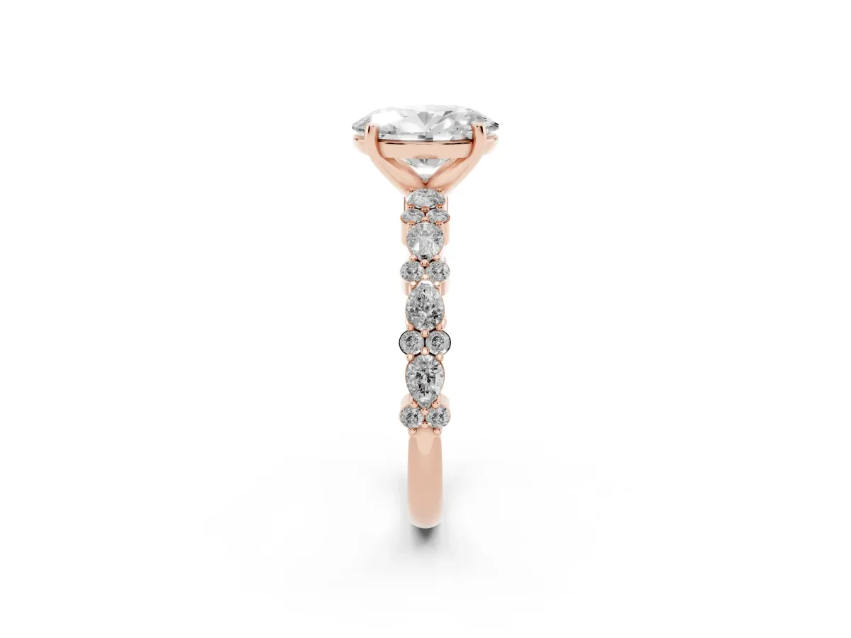Oval Cut Diamond Side Stone Solitaire Ring with Round and Four-Prong Setting Rose gold