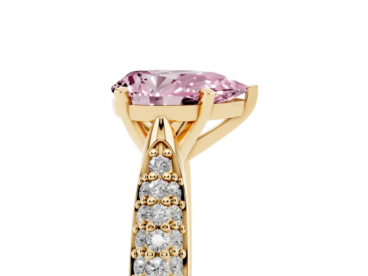 Fancy Pink Pear Cut Diamond Solitaire Engagement Ring with Multi-Row Round Pavé Band and Prong Setting Yellow gold