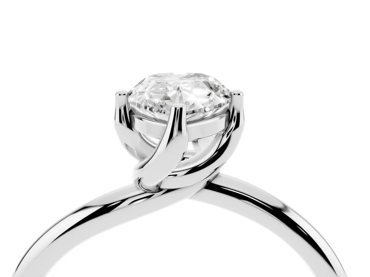 Pear Cut Diamond Solitaire Engagement Ring with Four-Prong Setting and Classic Band Silver