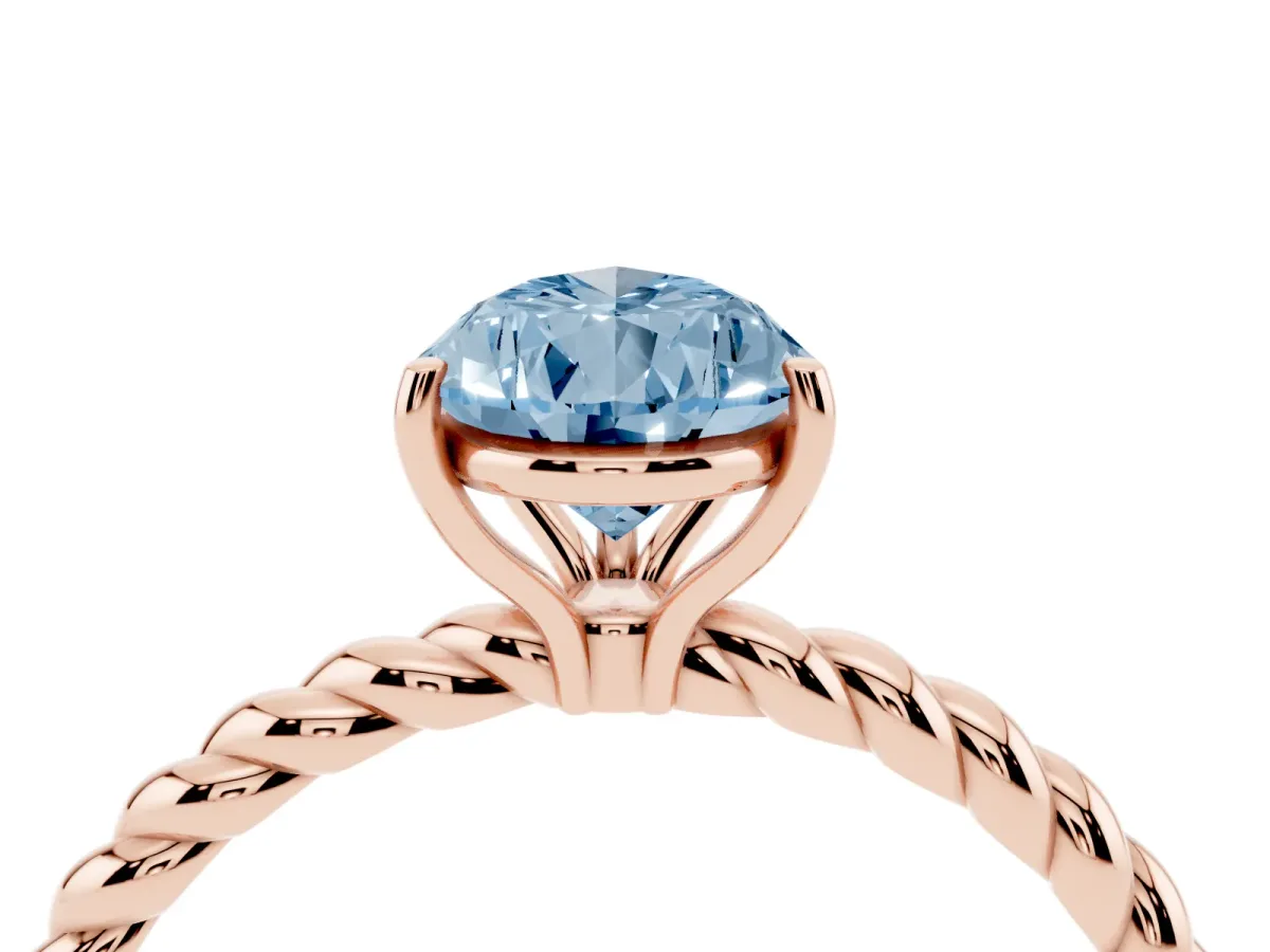 Fancy Blue Pear Cut Solitaire Twist Band Ring with Four-Prong Setting Rose gold