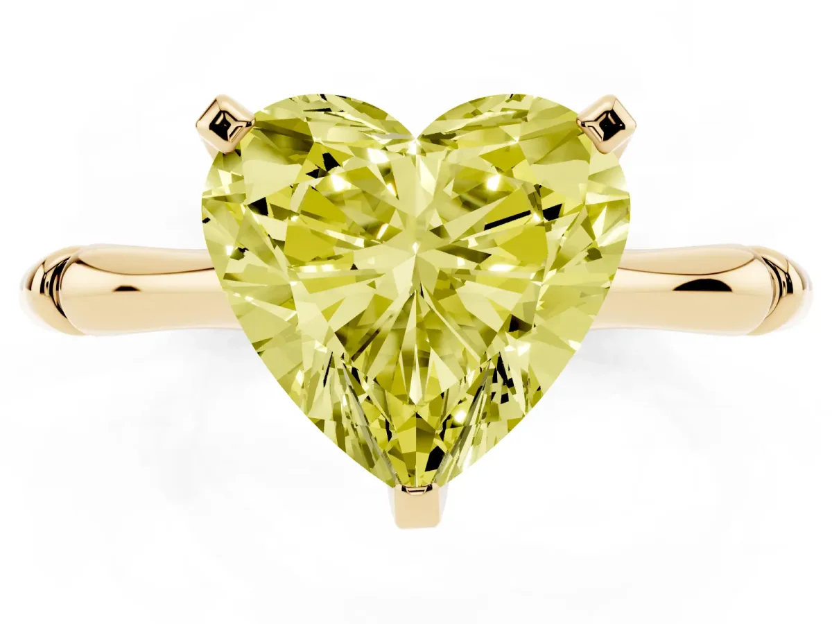 Fancy Yellow Heart Cut Solitaire Diamond Ring with Bamboo Band and Four-Prong Setting Yellow gold