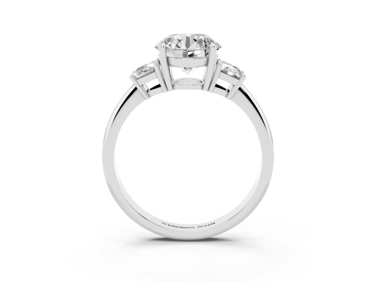 Round Cut Diamond Three-Stone Ring with Trapezoid Side Stones and Prong Setting Platinum