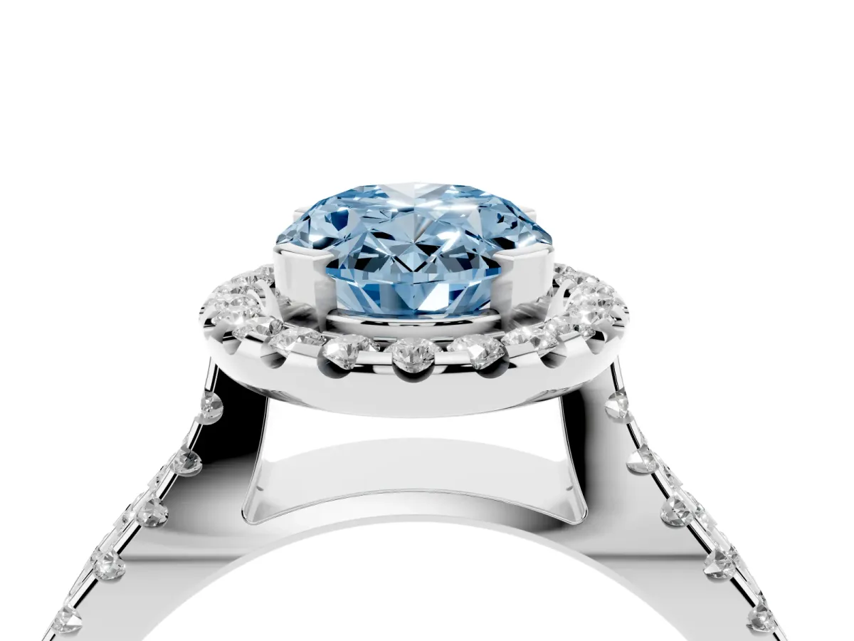 Fancy Blue Oval Cut Diamond Halo Ring with Split Shank Pavé Band and Prong Setting Silver