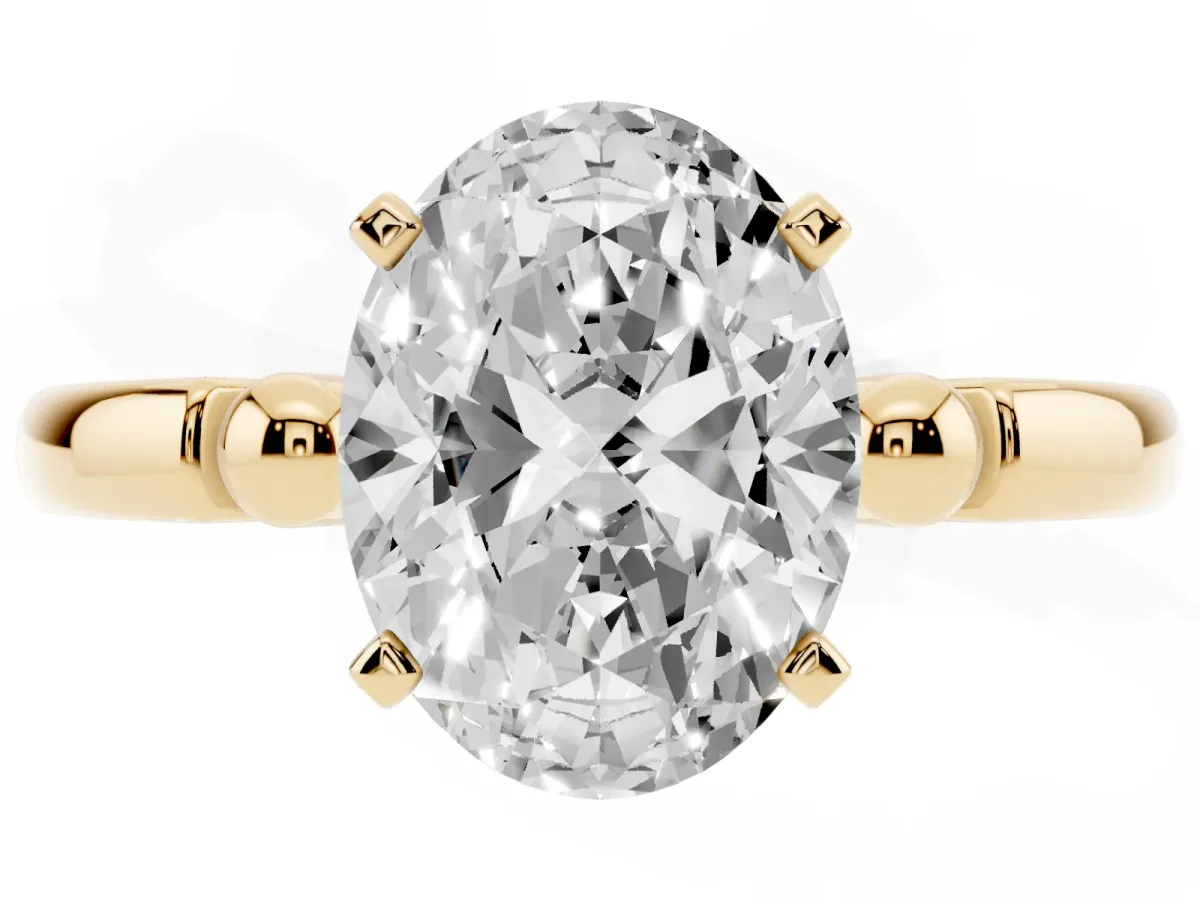 Oval Cut Solitaire Beaded Band with Four-Prong Setting Yellow gold
