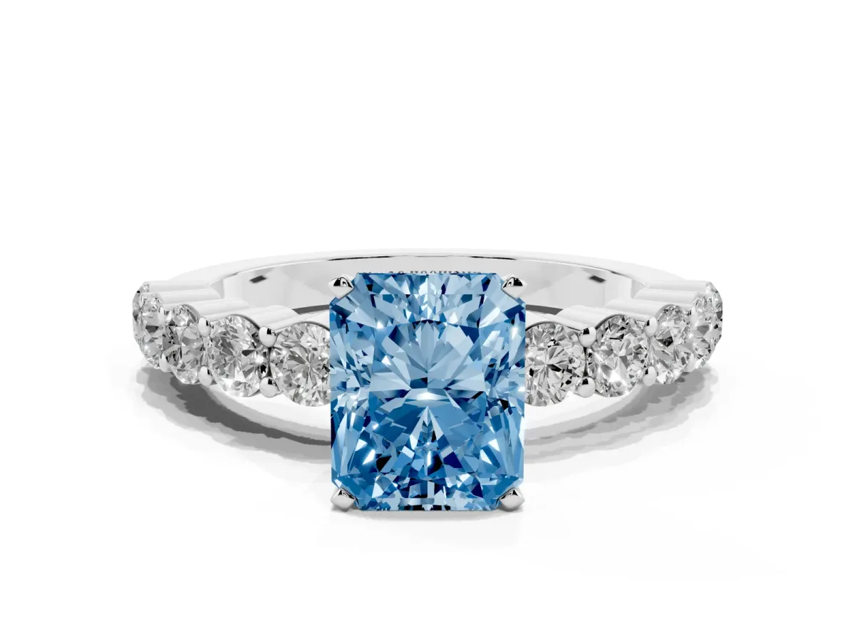 Fancy Blue Radiant Cut Diamond Solitaire Ring with Shared Prong Round Side Stones Platinum