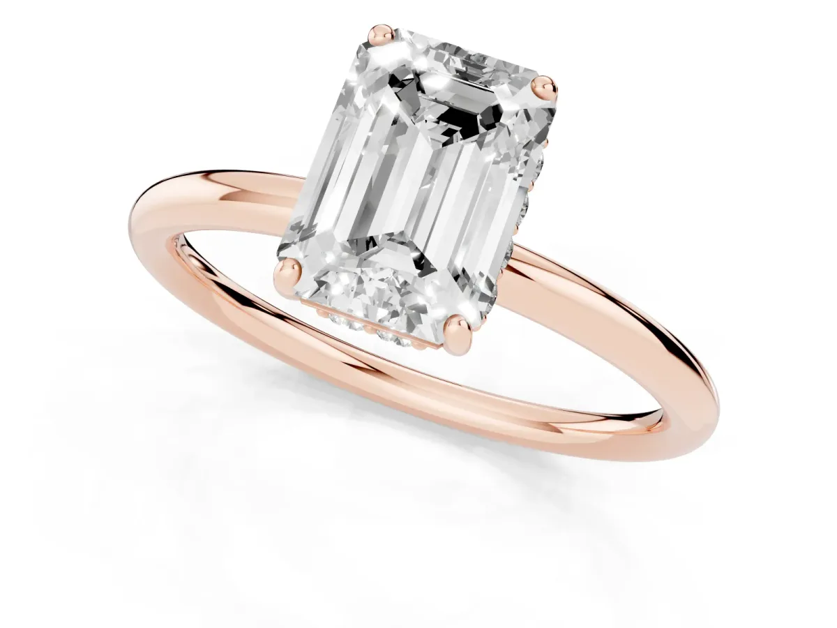 Emerald Cut Solitaire Diamond Ring with a Classic Band and Four-Prong Setting Rose gold