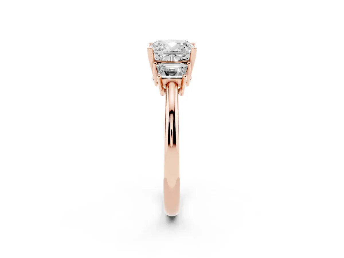 Cushion Cut Diamond Three-Stone Ring with Trapezoid Side Stones and Prong Setting Rose gold