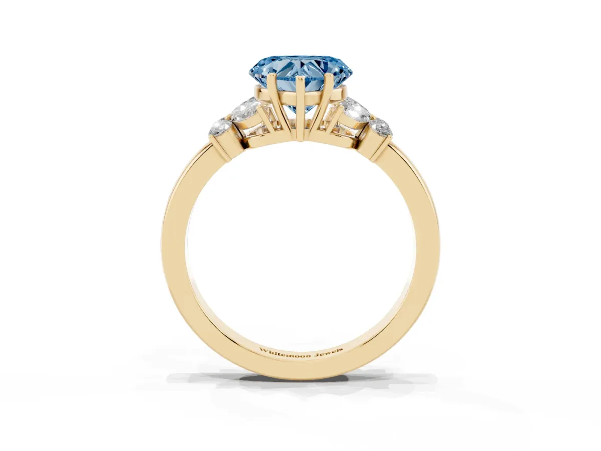 Fancy Blue Heart Cut Cut Solitaire Floral Diamond Ring with Four-Prong Setting Yellow gold