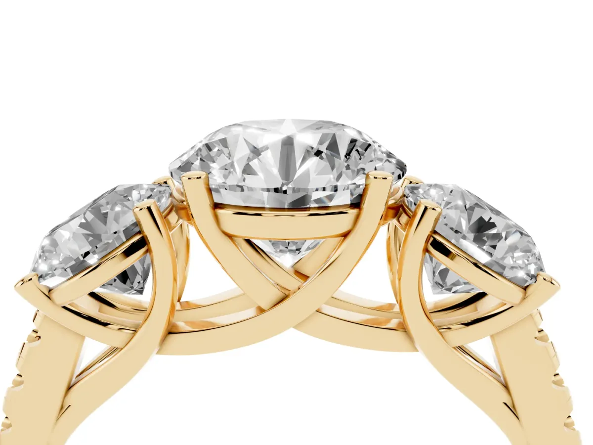 Three-Stone Round Cut Diamond Ring with Round Pavé Band and Prong Setting Yellow gold