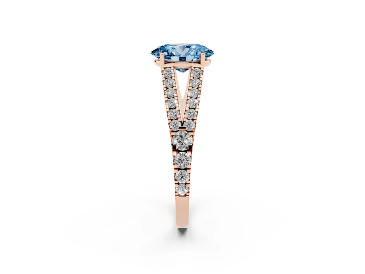 Fancy Blue Oval Cut Diamond Split Shank Engagement Ring with Round Pavé and Prong Setting Rose gold