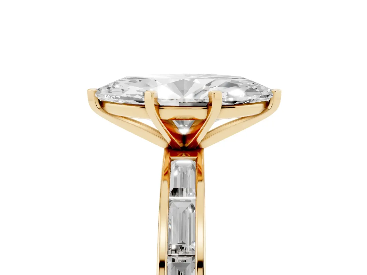 Marquise Cut Solitaire Diamond Ring with Channel-Set Baguette Band and Four-Prong Setting Yellow gold