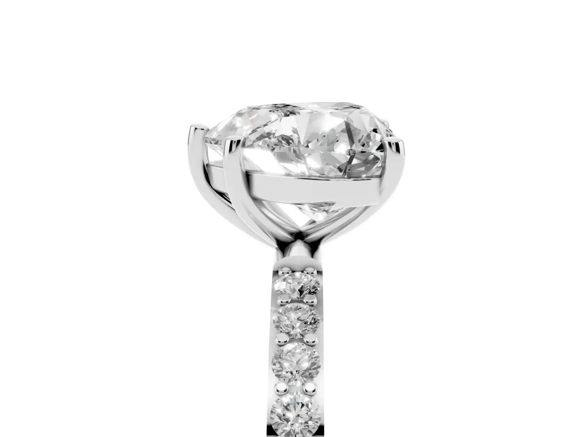 Heart Cut Diamond Solitaire Ring with Round Pavé Shoulders and Prong Setting Silver