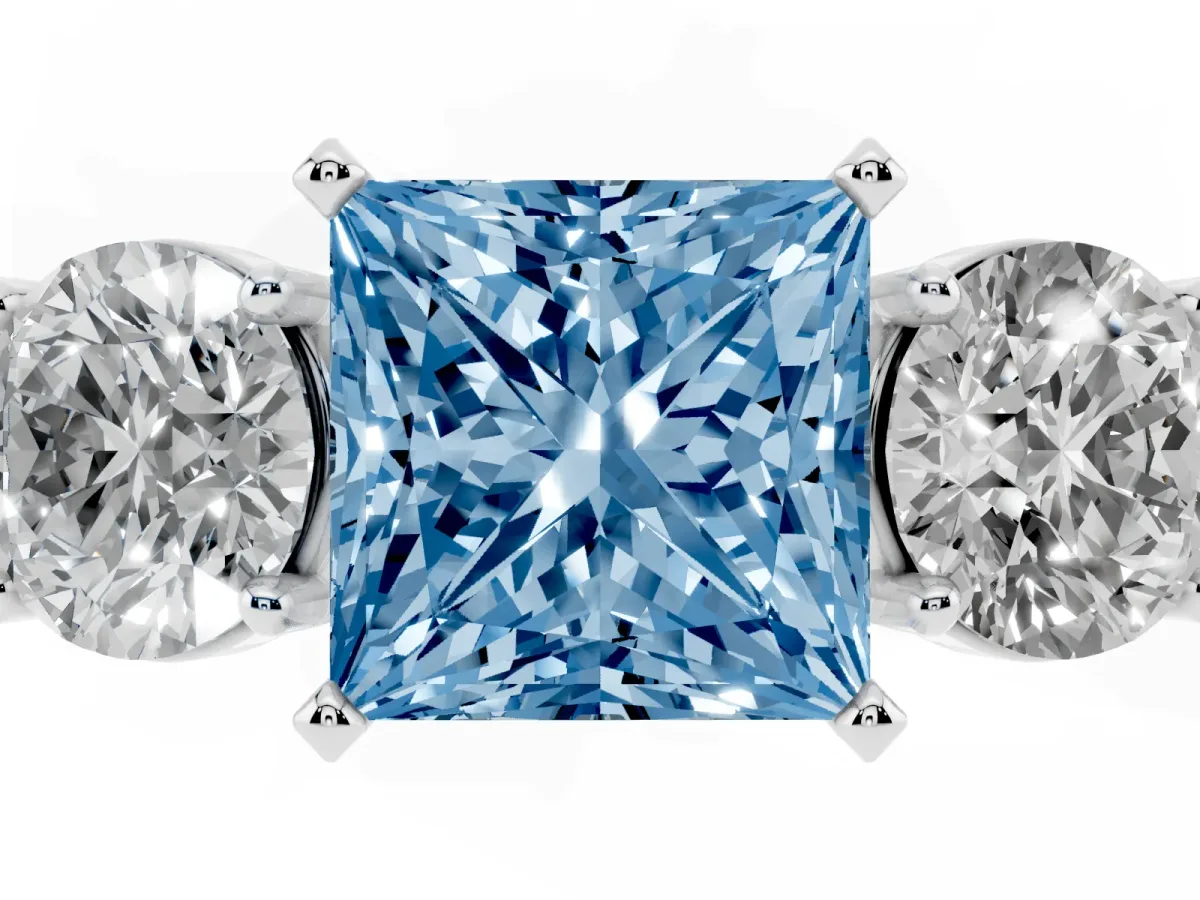 Fancy Blue Three-Stone Princess Cut Diamond Ring with Round Side Stones, Classic Band, and Four-Prong Setting White gold