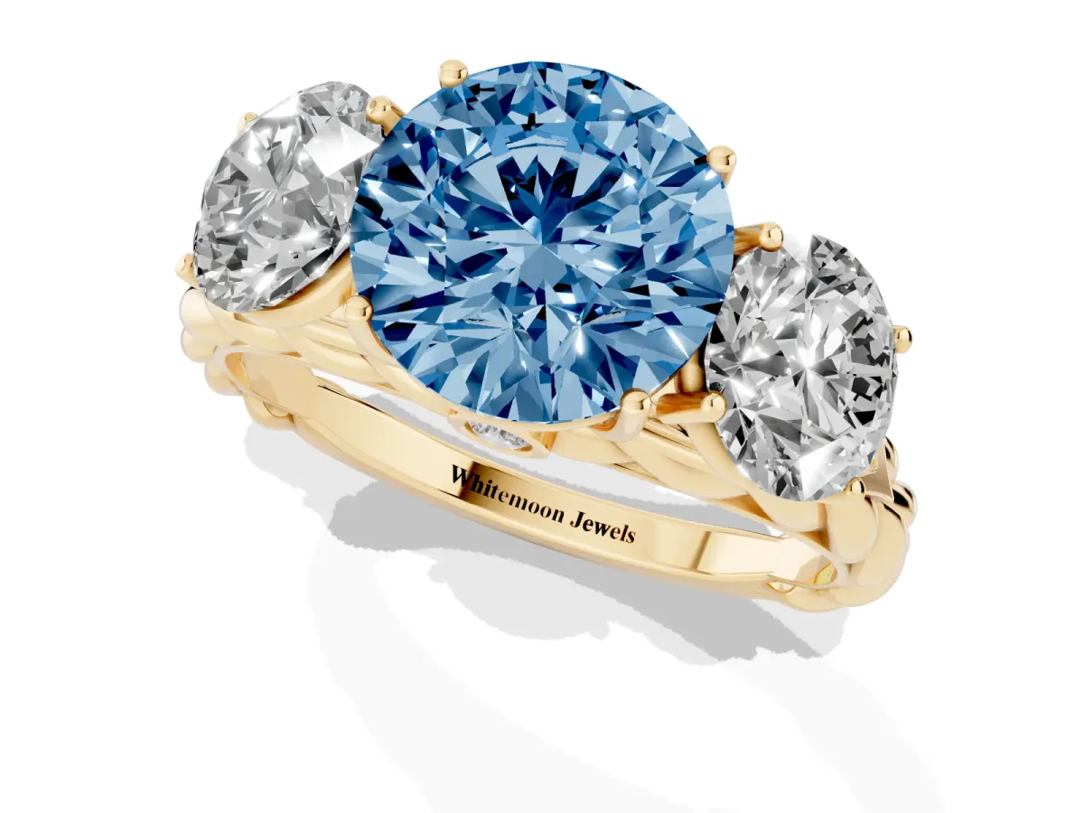 Fancy Blue Three-Stone Round Cut Diamond Braided Band Ring with Four-Prong Setting Yellow gold
