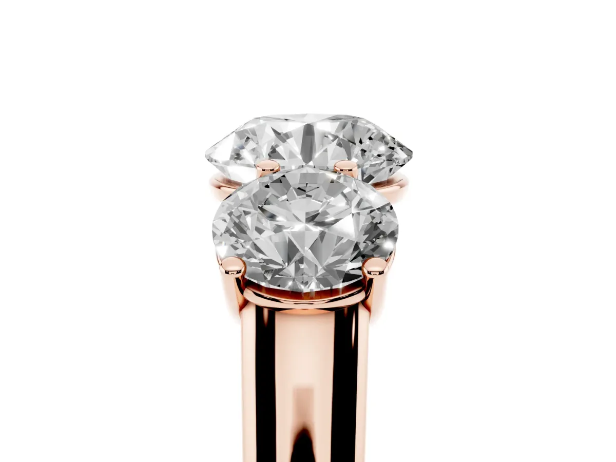 Round Cut Three-Stone Diamond Ring with Prong Setting on a Classic Band Rose gold