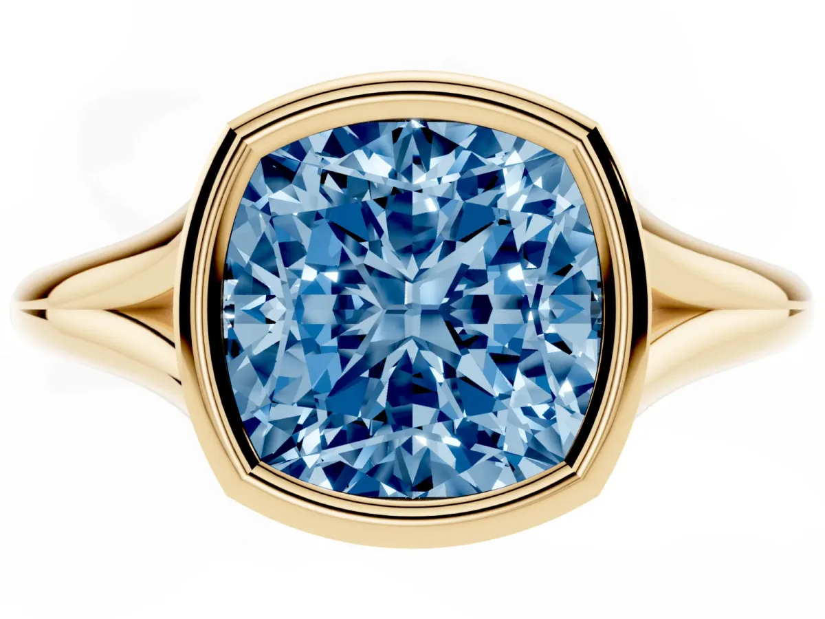 Fancy Blue Bezel Set Cushion Cut Cut Solitaire Ring with Tapered Band Yellow gold