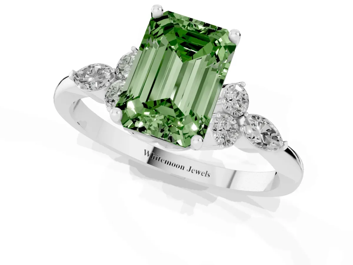 Fancy Green Emerald Cut Brilliant Diamond Solitaire Ring with Pear Side Stones and Four-Prong Setting Platinum