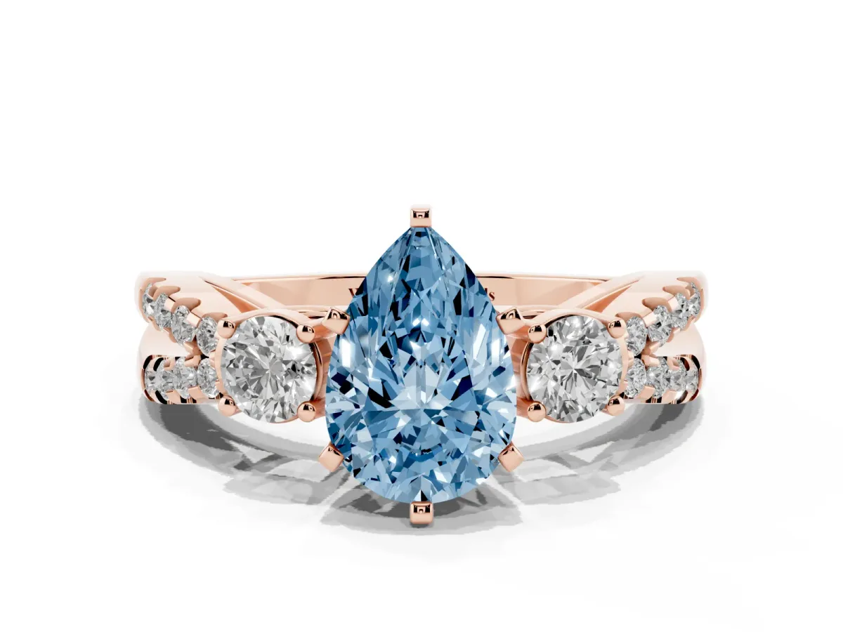 Fancy Blue Pear Cut Diamond Three-Stone Ring with Pavé Split Shank and Four-Prong Setting Rose gold
