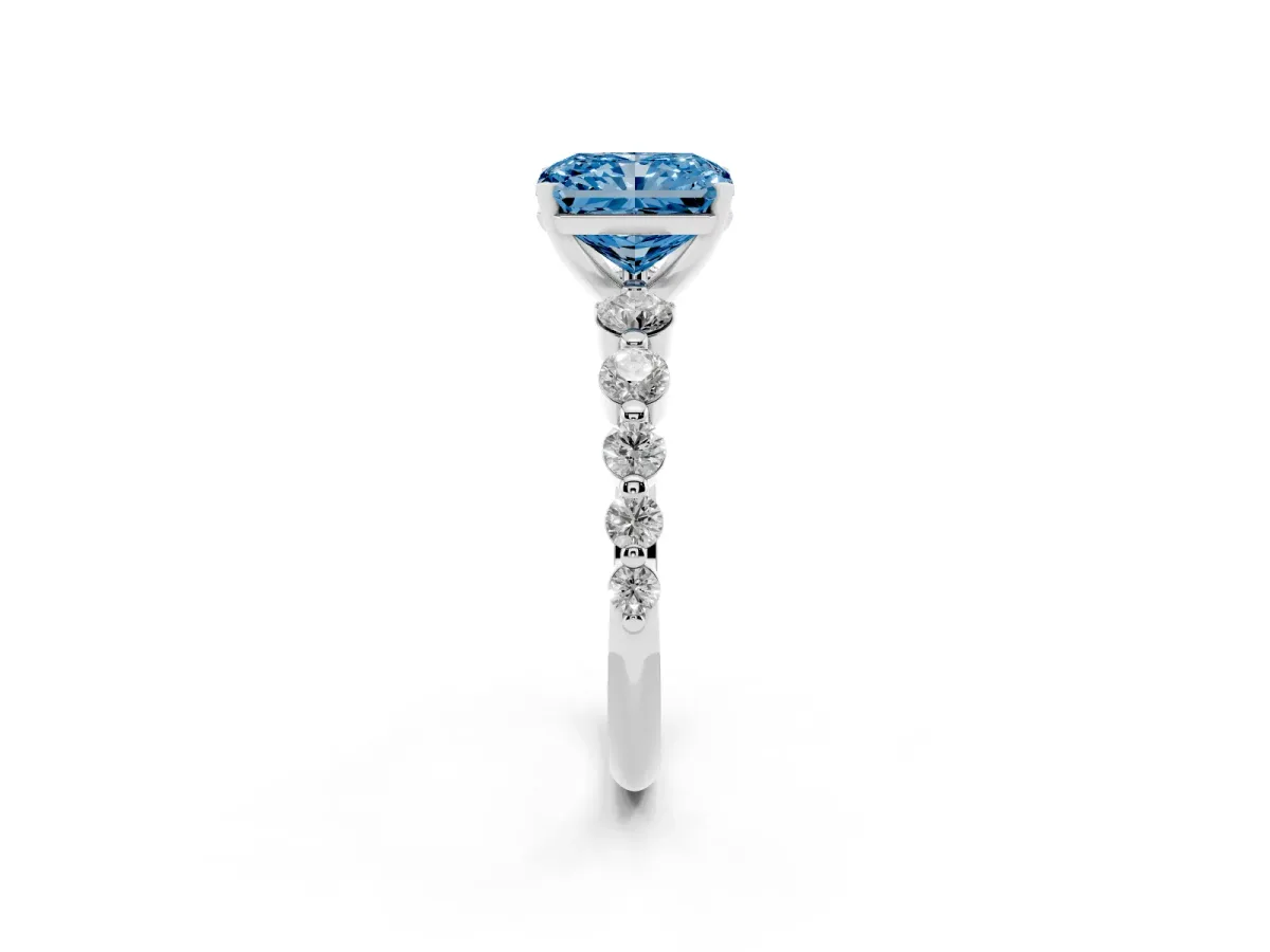 Fancy Blue Radiant Cut Solitaire Diamond Ring with Pave Band and Four-Prong Setting Silver