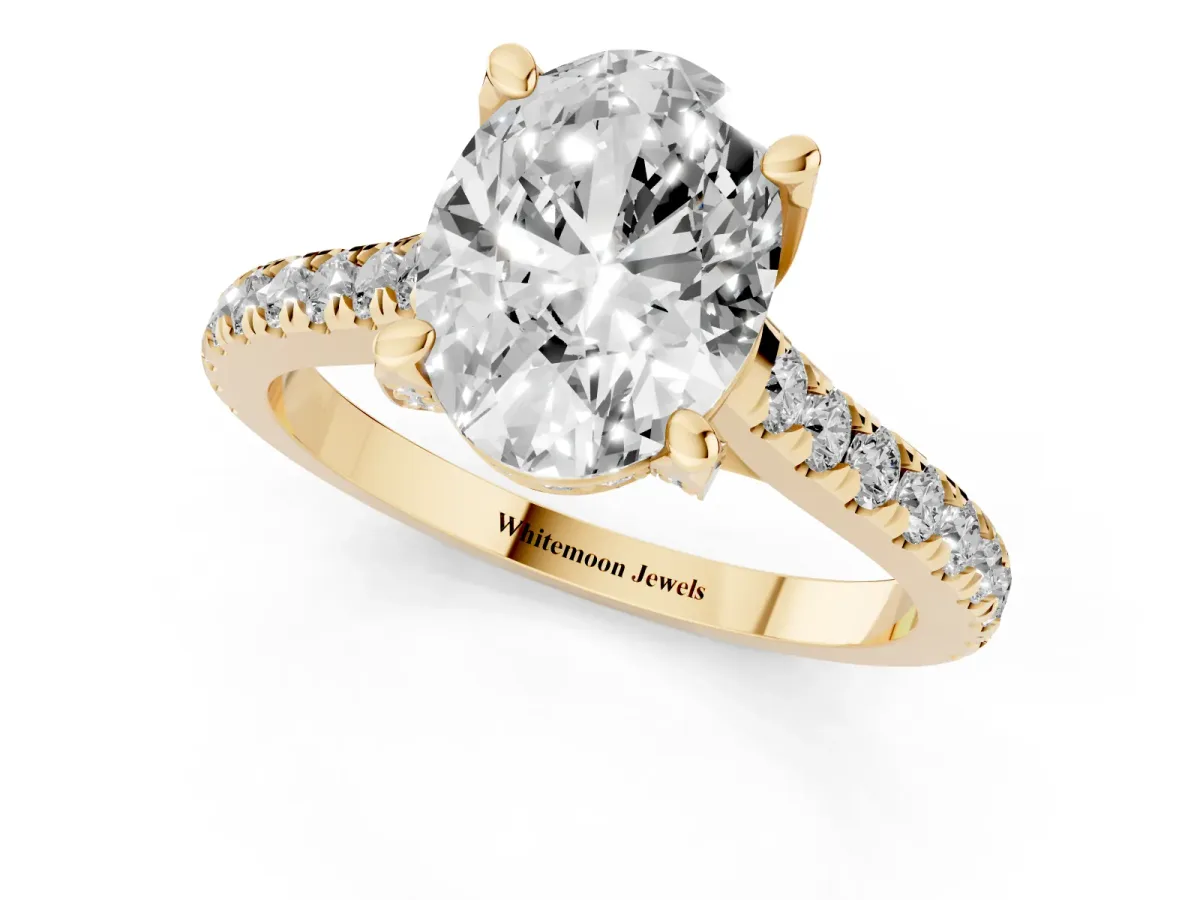 Oval Cut Brilliant Diamond Solitaire with Pavé Band and Four-Prong Setting Yellow gold