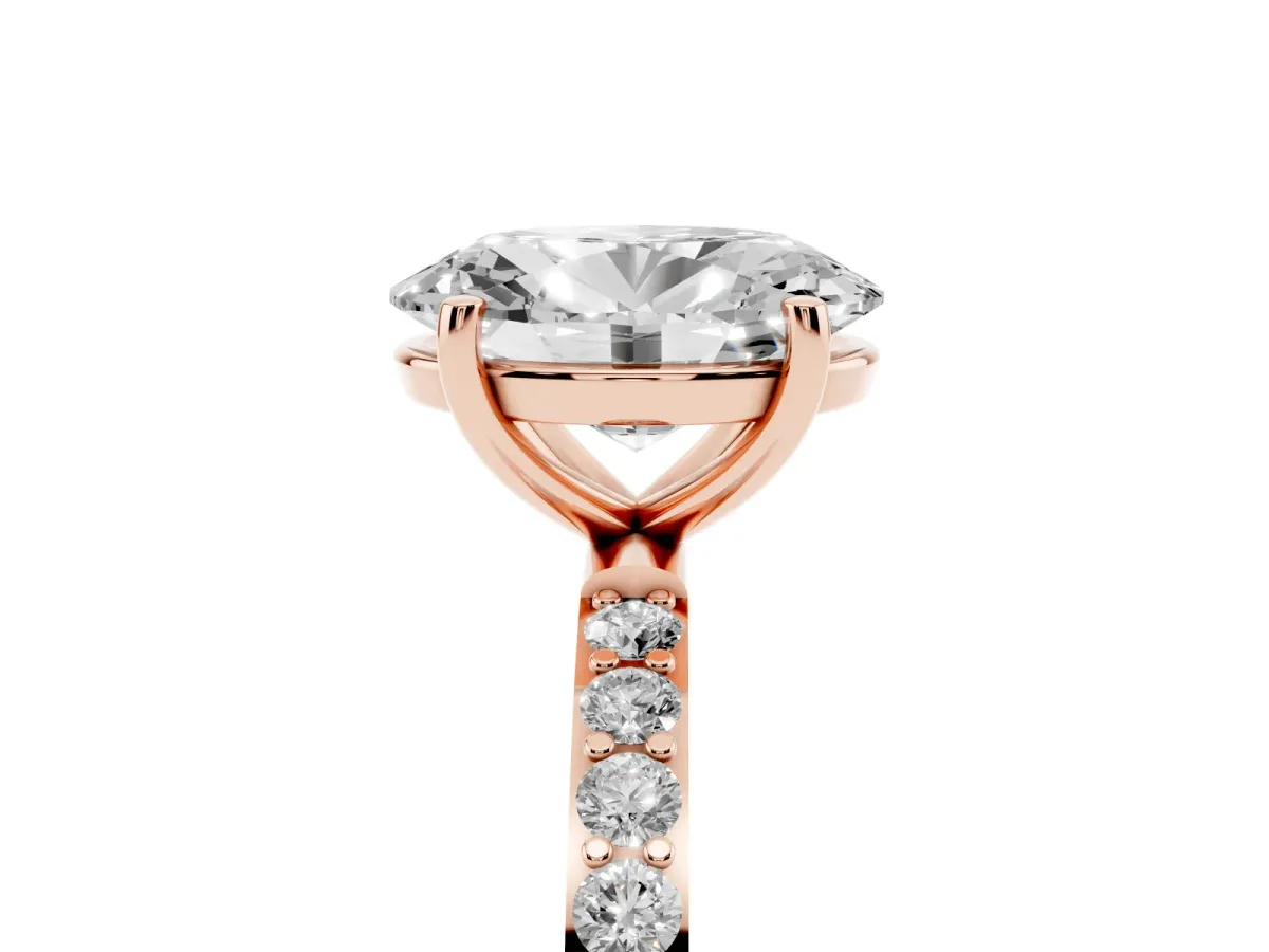 Oval Cut Diamond Solitaire Ring with Round Pavé Shoulders and Prong Setting Rose gold