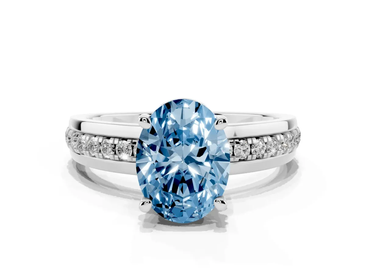 Fancy Blue Oval Cut Solitaire Diamond Ring with Channel Set Band and Six-Prong Setting Silver