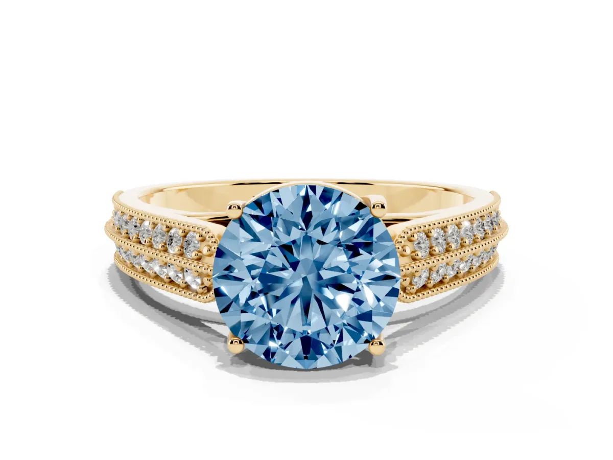 Fancy Blue Round Cut Cut Pave Split Shank Engagement Ring with Four-Prong Setting Yellow gold