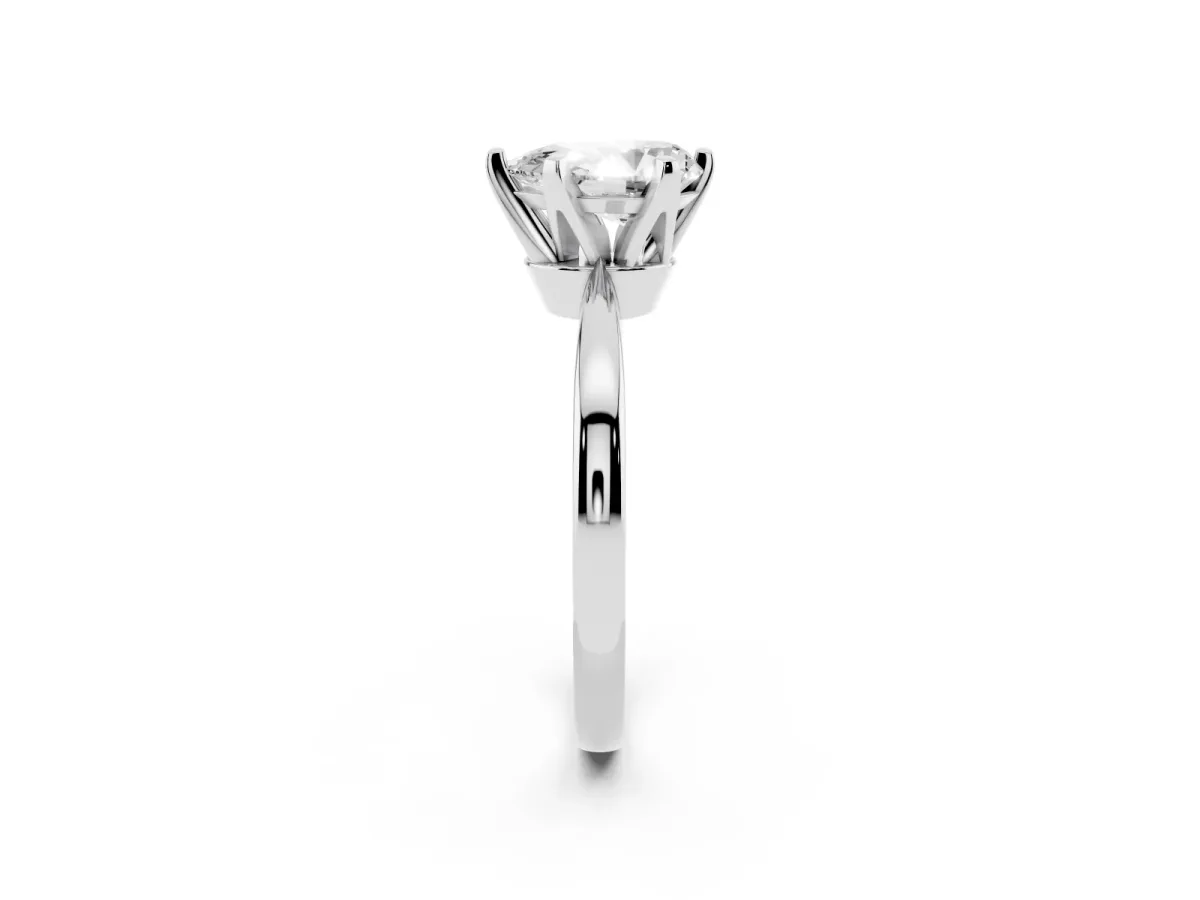 Pear Cut Solitaire Engagement Ring with Six-Prong Setting and Tapered Band Platinum
