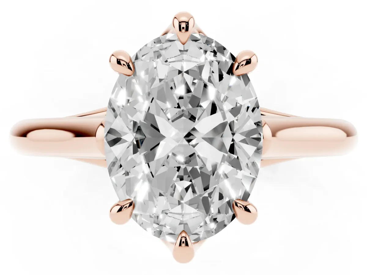 Oval Cut Solitaire Engagement Ring with Six-Prong Setting and Classic Band Rose gold