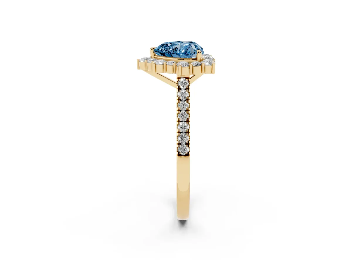 Fancy Blue Heart Cut Halo Diamond Ring with Pavé Band and Prong Setting Yellow gold