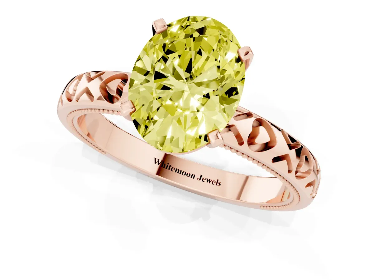 Fancy Yellow Oval Cut Solitaire Diamond Engagement Ring with XO Engraved Band and Four-Prong Setting Rose gold