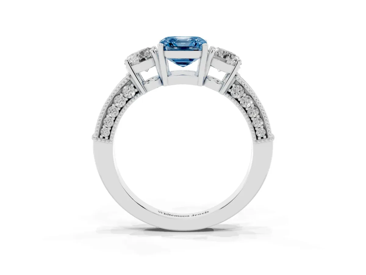 Fancy Blue Asscher Cut Three-Stone Diamond Ring with Pavé Band and Four-Prong Setting Silver