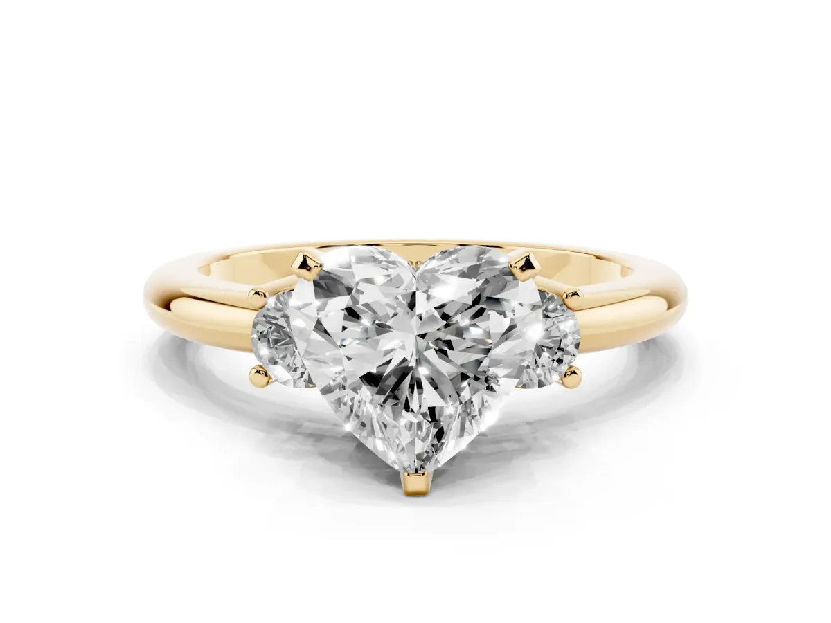 Three-Stone Heart Cut Cut Diamond Solitaire with Prong Setting and Classic Band Yellow gold