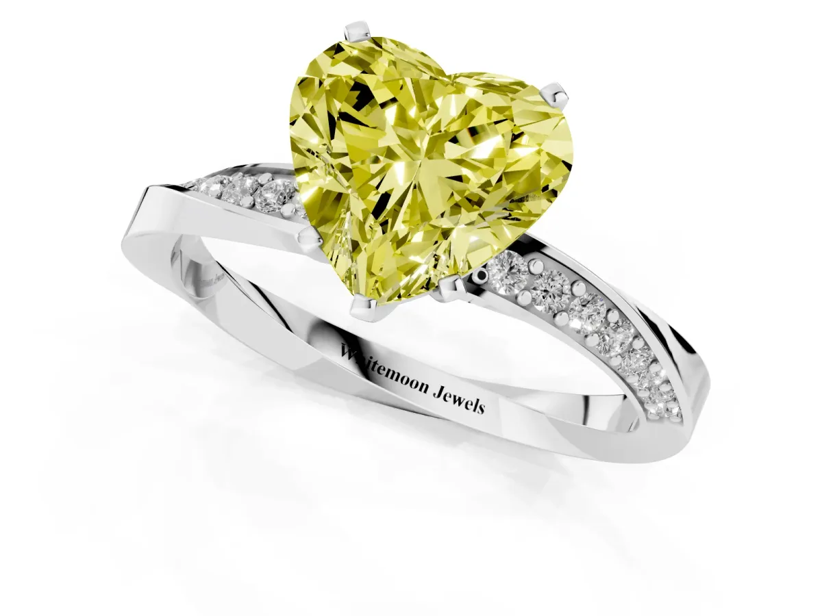 Fancy Yellow Heart Cut Diamond Engagement Ring with Side Stone Accents and Four-Prong Setting Silver