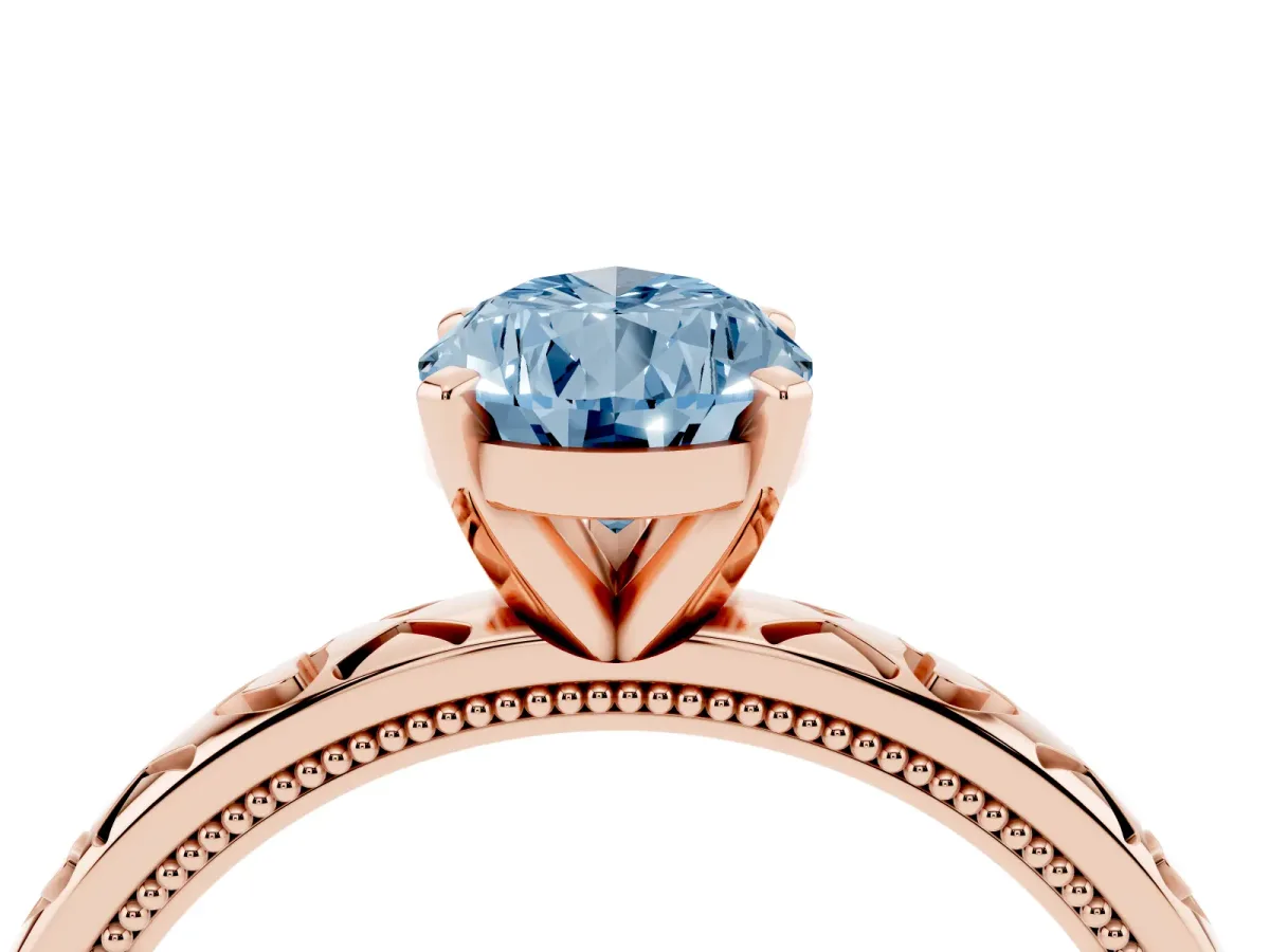 Fancy Blue Pear Cut Solitaire Diamond Engagement Ring with XO Engraved Band and Four-Prong Setting Rose gold