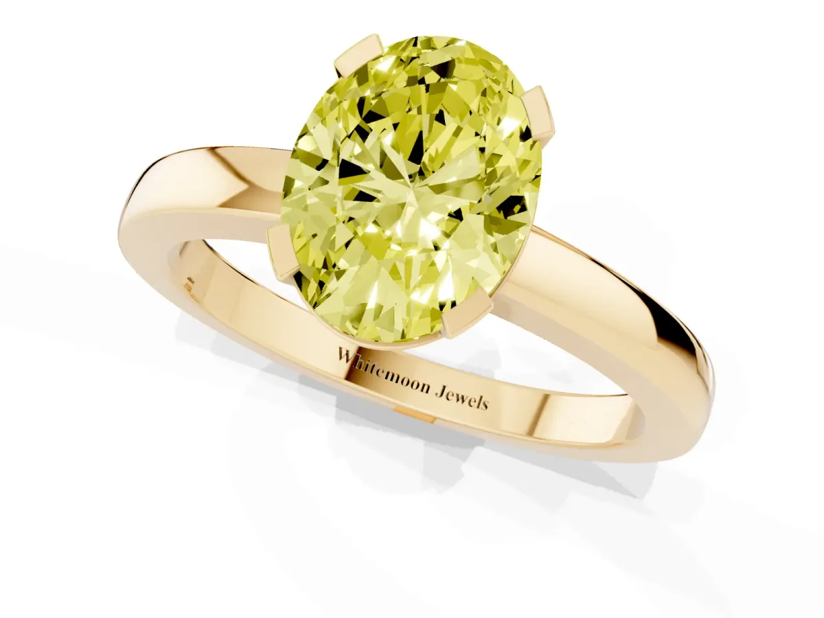 Fancy Yellow Oval Cut Cut Solitaire Ring with Four-Prong Setting and Classic Band Yellow gold