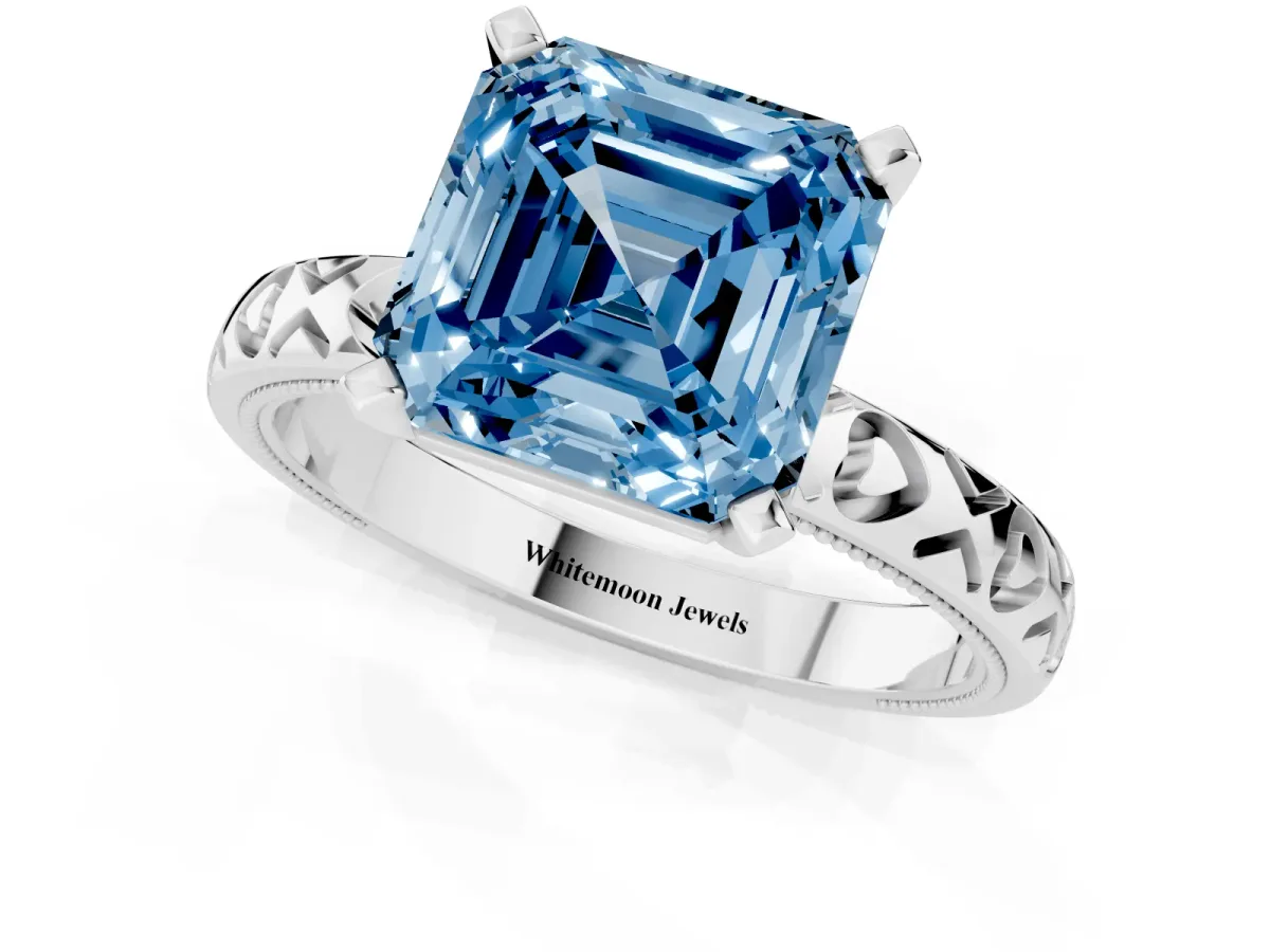 Fancy Blue Asscher Cut Solitaire Diamond Engagement Ring with XO Engraved Band and Four-Prong Setting Silver