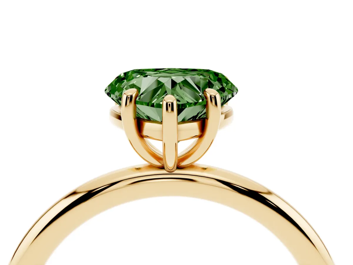 Fancy Green Heart Cut Solitaire Diamond Ring with Four-Prong Setting on a Plain Band Yellow gold