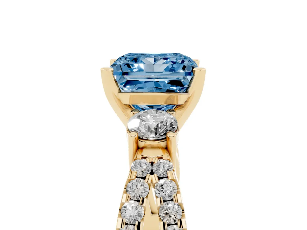 Fancy Blue Princess Cut Diamond Three-Stone Ring with Pavé Split Shank and Four-Prong Setting Yellow gold