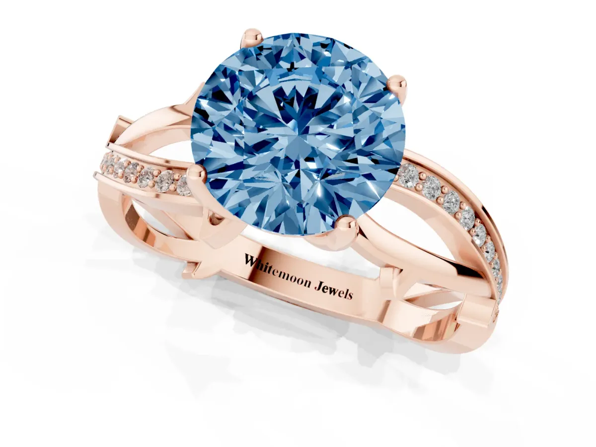 Fancy Blue Round Cut Solitaire Twist Band with Pavé Accents and Four-Prong Setting Rose gold
