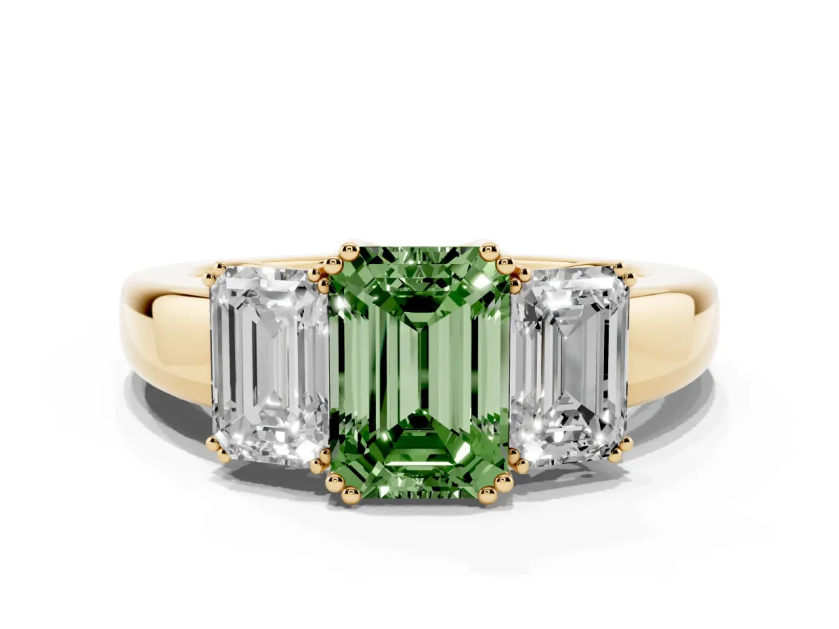 Fancy Green Three-Stone Emerald Cut Cut Diamond Ring with Channel Set Band and Four-Prong Setting Yellow gold