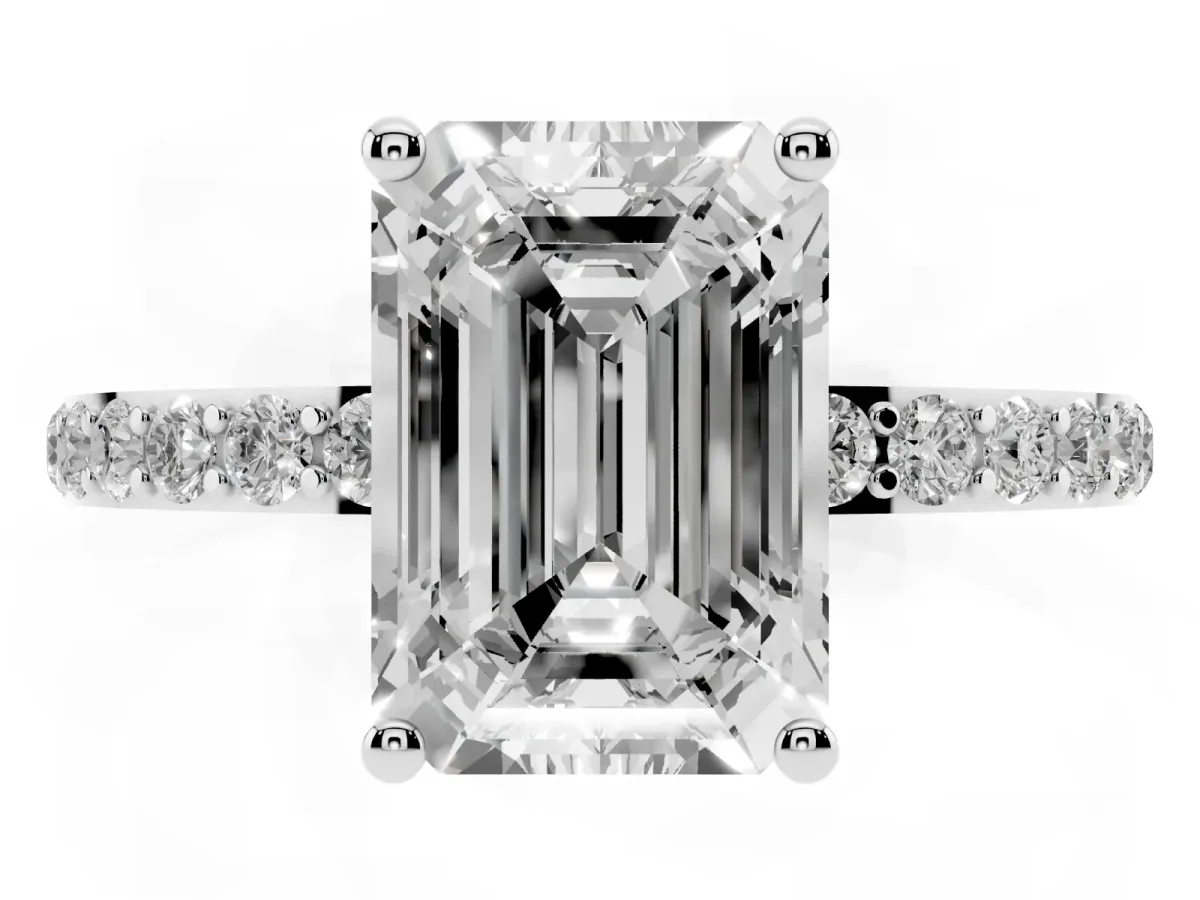 Emerald Cut Diamond Solitaire Ring with Round Pavé Shoulders and Prong Setting Silver