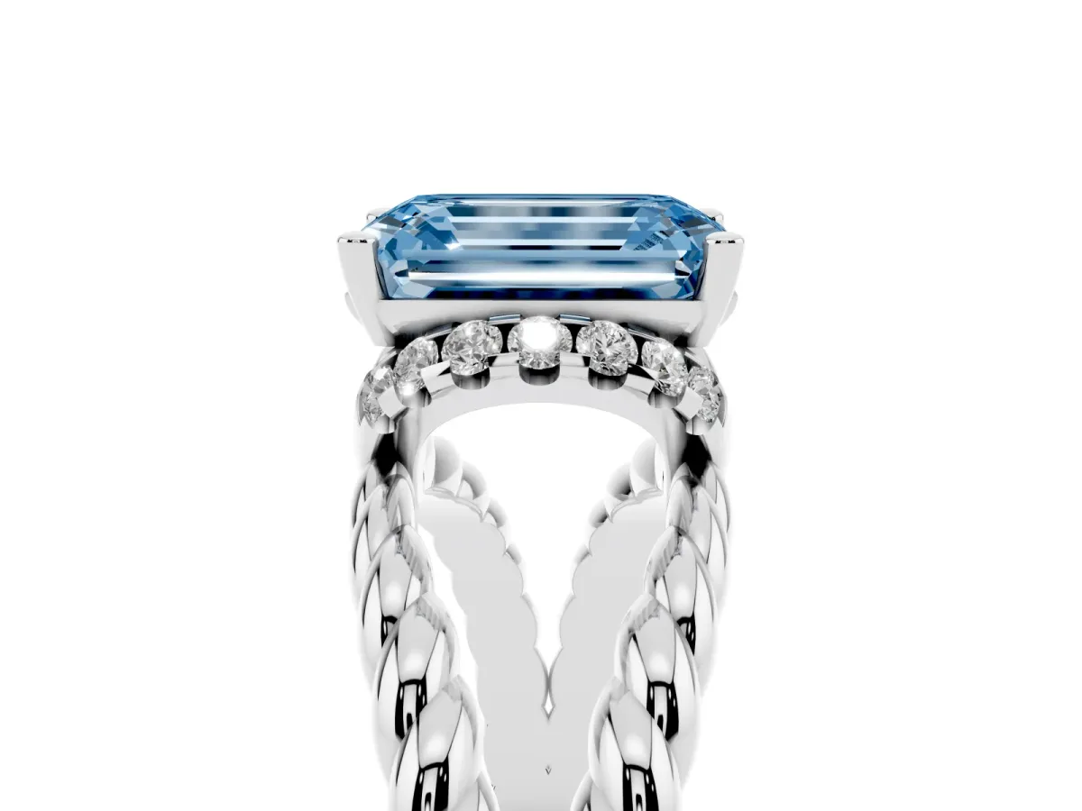 Fancy Blue Emerald Cut Halo Twisted Band Four-Prong Ring Silver