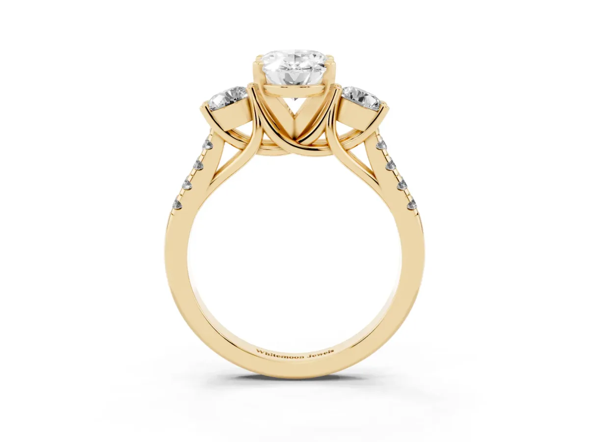Three-Stone Oval Cut Diamond Pavé Band with Four-Prong Setting Yellow gold