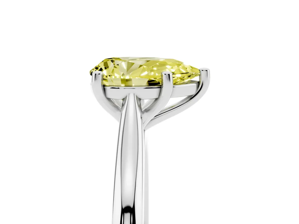 Fancy Yellow Pear Cut Cut Solitaire Ring with Cathedral Band and Four-Prong Setting Silver