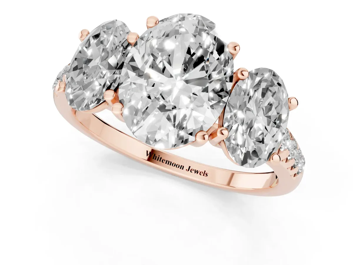 Three-Stone Oval Cut Diamond Ring with Round Pavé Band and Prong Setting Rose gold