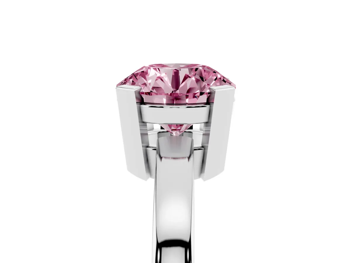 Fancy Pink Round Cut Cut Solitaire Ring with Four-Prong Setting and Classic Band Silver