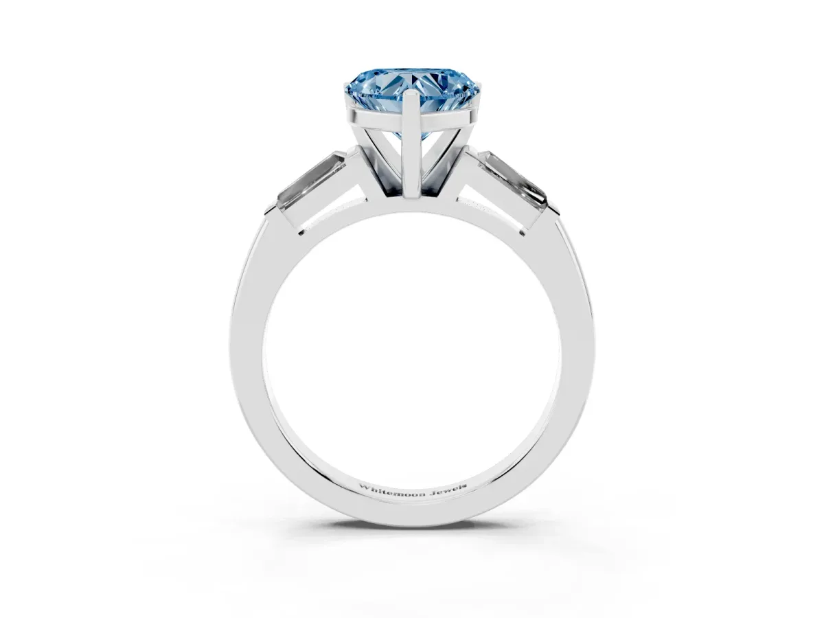 Fancy Blue Heart Cut Solitaire with Tapered Baguette Side Stones on a Classic Band with Four-Prong Setting White gold